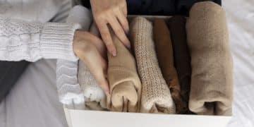 close-up-hands-holding-shirt